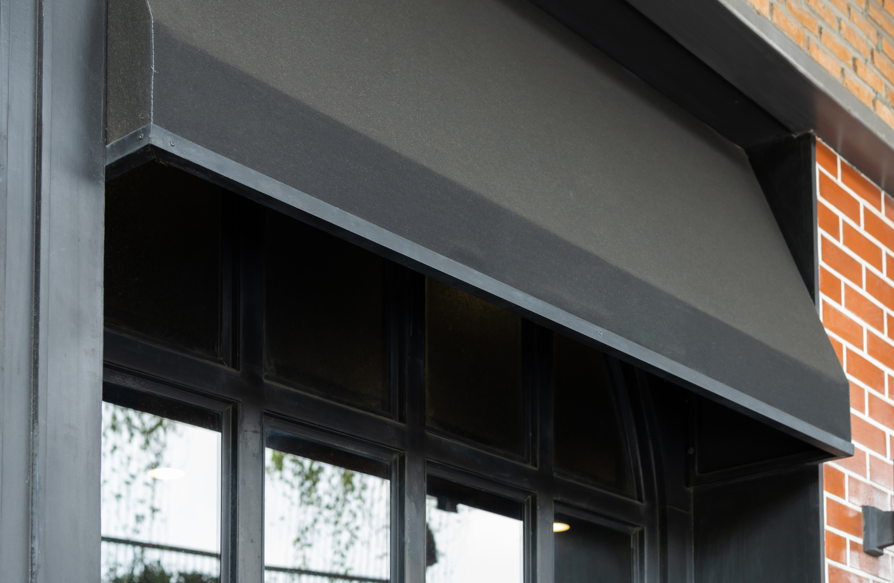 black awning of restaurant window.